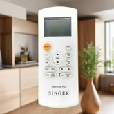 Singer remote control with leafy background